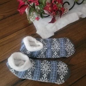 Fuzzy slipper socks with non slip grips on bottom